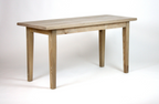 A rectangular wooden table unfinished, featuring four legs and a simple design, photographed against a white studio background.