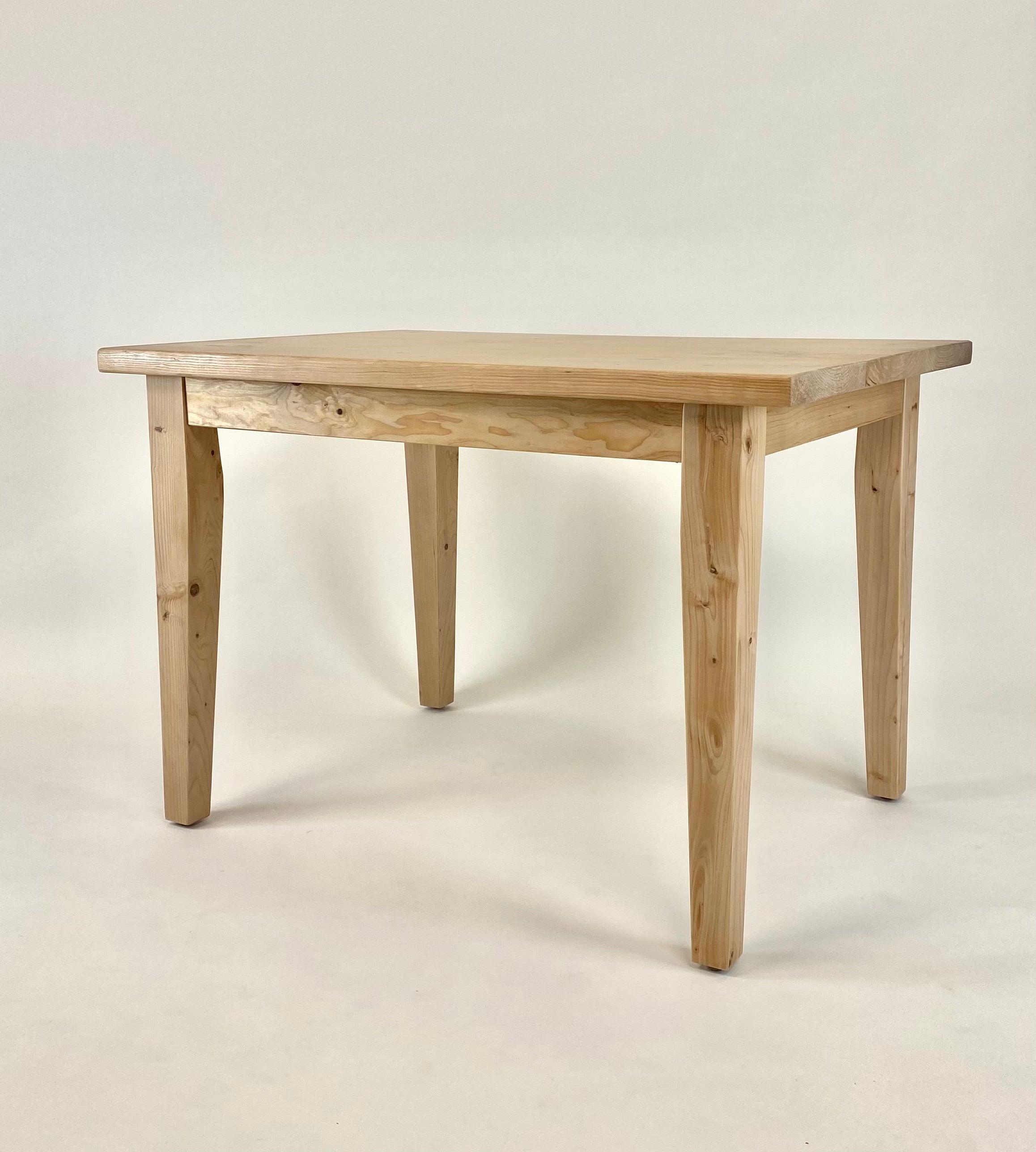 French farmhouse kitchen table handcrafted from reclaimed wood