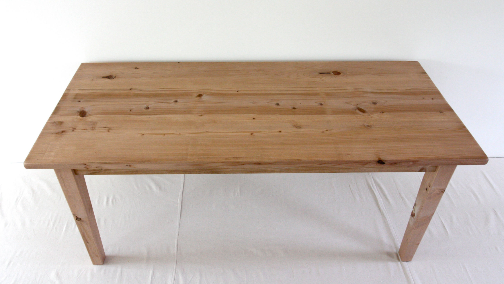 French farmhouse kitchen table handcrafted from reclaimed wood