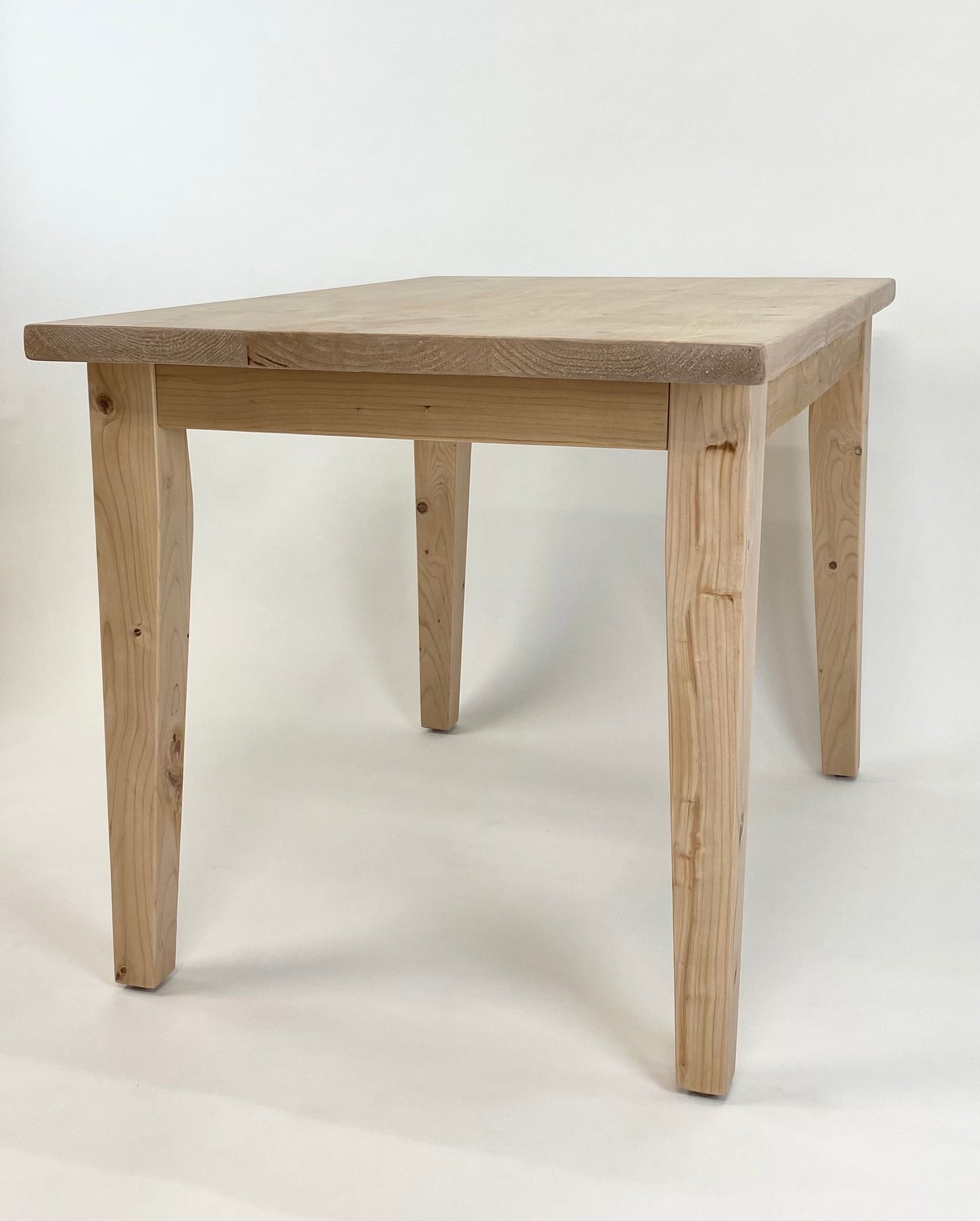 French farmhouse kitchen table handcrafted from reclaimed wood