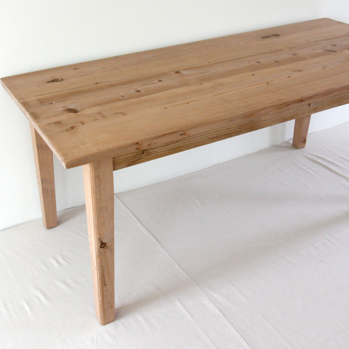 French farmhouse table handcrafted from reclaimed wood