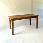 Provincial Farmhouse Desk in a Heritage finish on a white background.