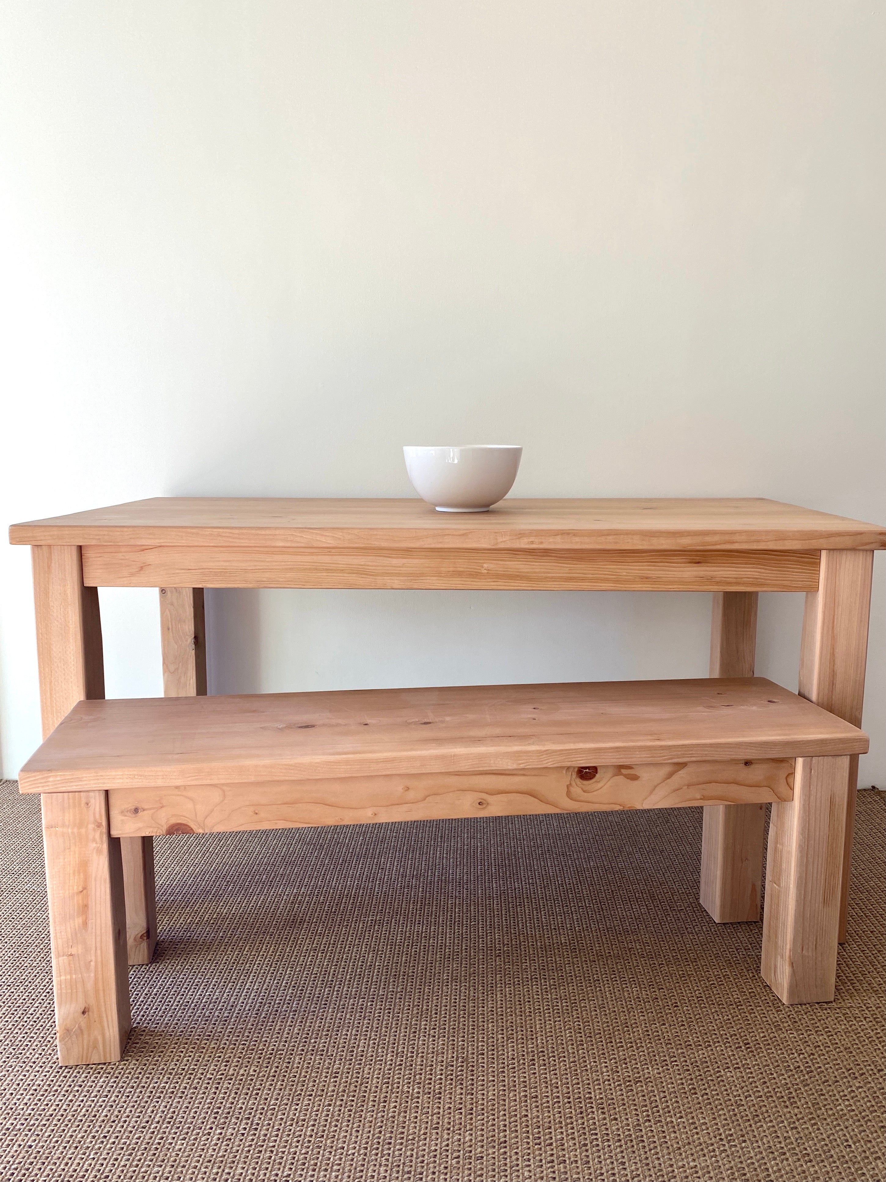 Coastal dining table and matching bench set handcrafted from solid wood