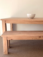 Coastal dining table and matching bench set handcrafted from solid wood