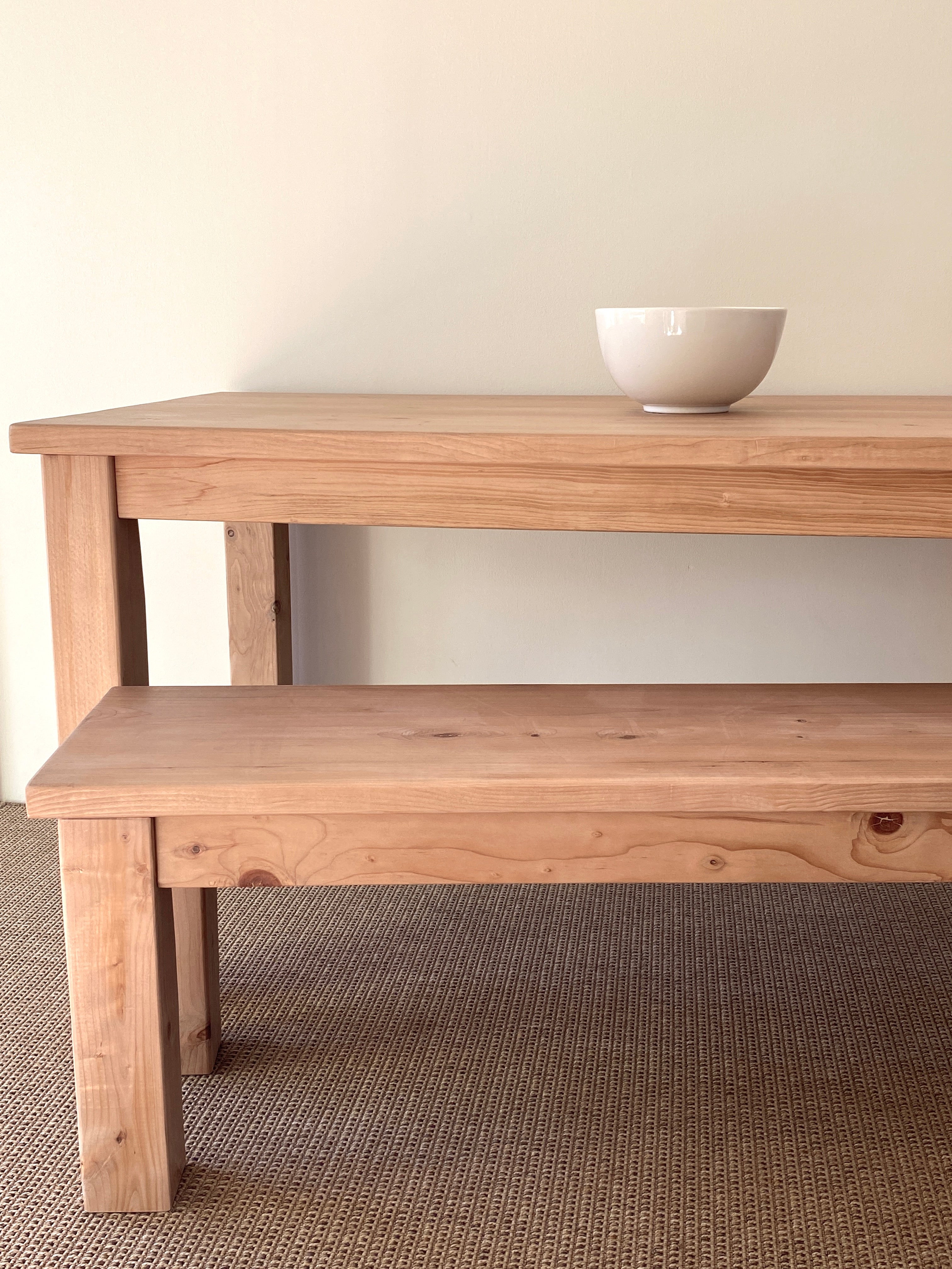 Coastal dining table and matching bench set handcrafted from solid wood