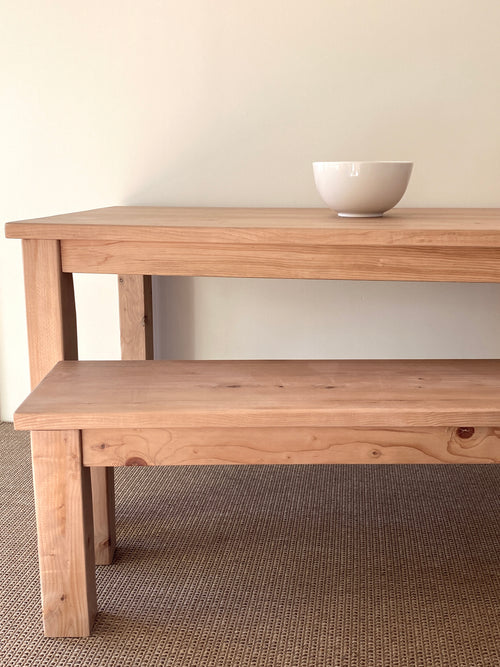 Coastal dining table and matching bench set handcrafted from solid wood