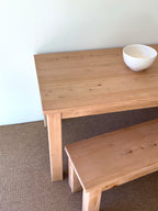 Coastal dining table and matching bench set handcrafted from solid wood