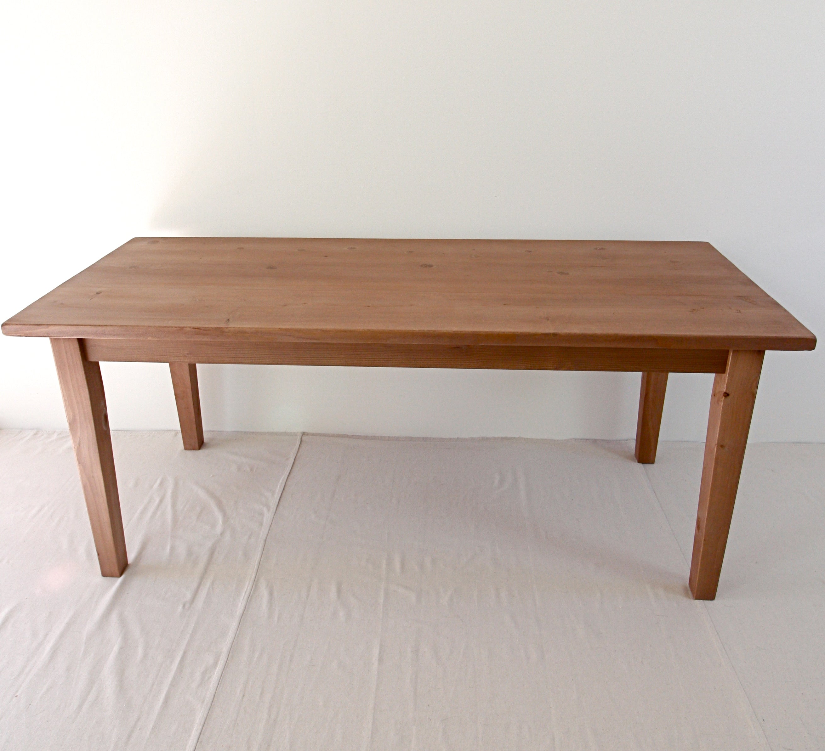 French farmhouse kitchen table handcrafted from reclaimed wood