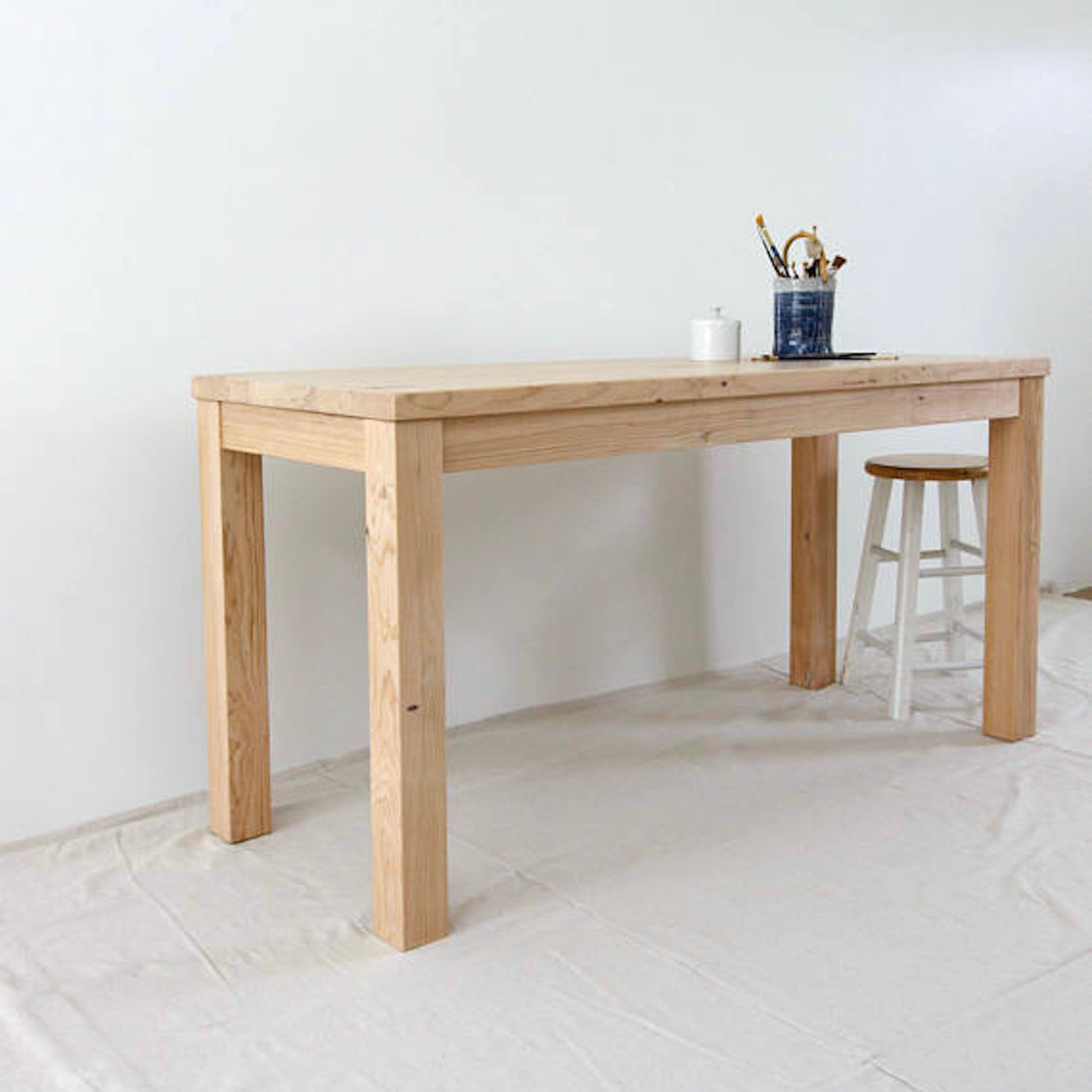 Parsons style wood work table handcrafted from reclaimed wood
