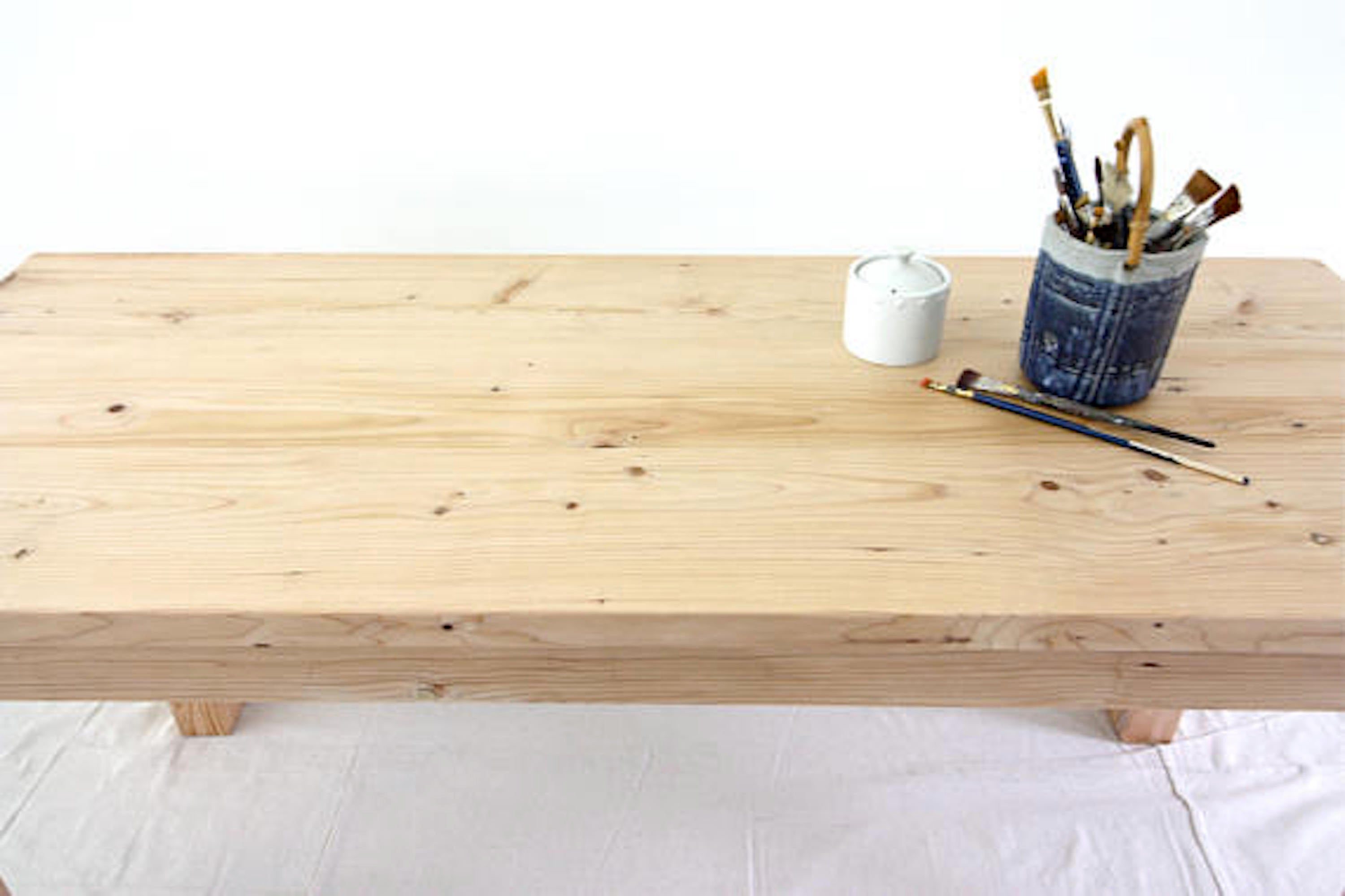 Parsons style wood work table handcrafted from reclaimed wood