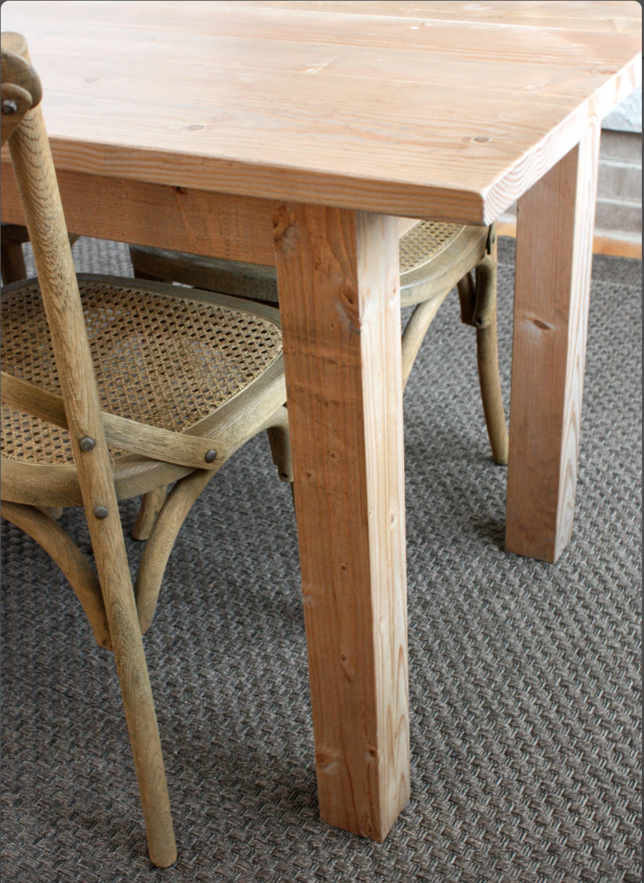 Straight leg dining table handcrafted from solid wood